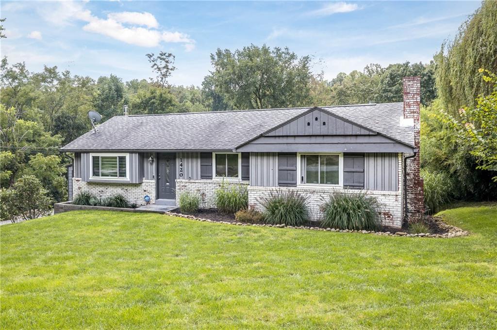 A clean open lawn with uniform greenery and a simple, uncluttered landscape that emphasizes its natural beauty.