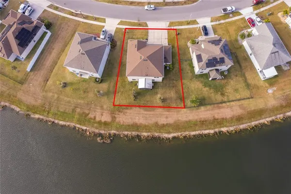 a view of walk in closet with open kitchen