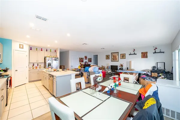 a view of a kitchen and dining room