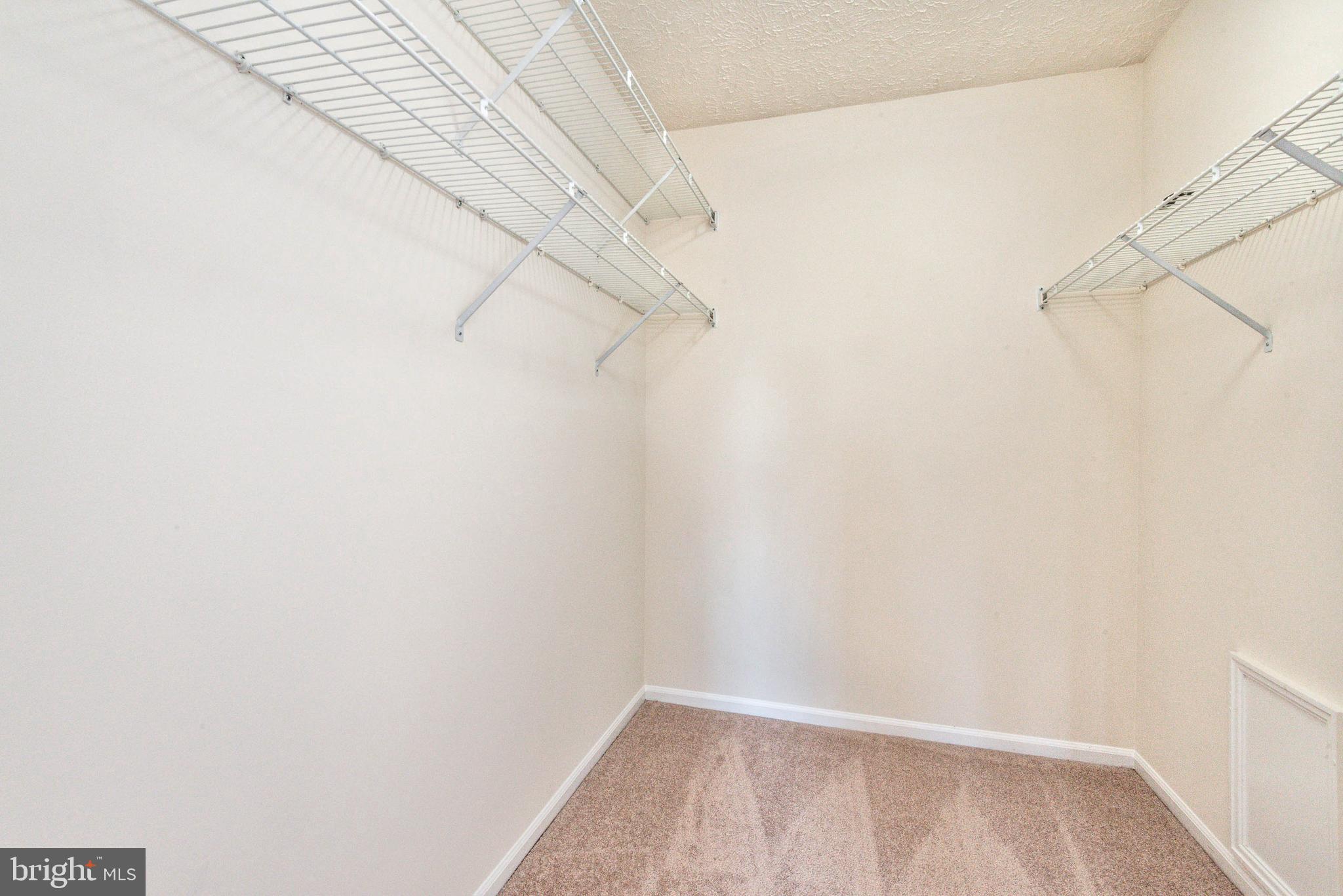 8584 Davis Road Columbia, MD 21045 - Photo 19 of 31 Master bedroom large walk-in closet