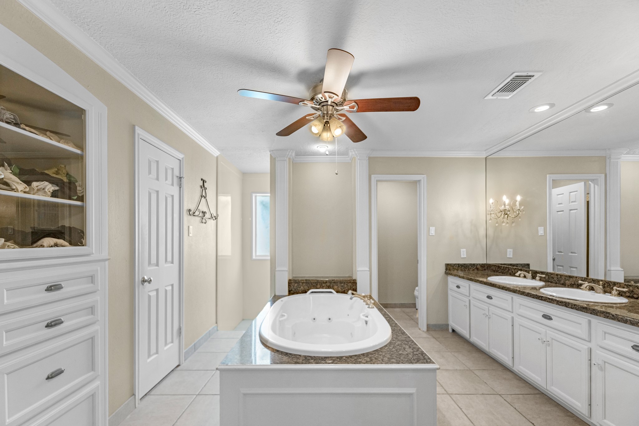 16114 Kempton Park Drive Spring, TX 77379 - Photo 11 of 22 a bathroom with a sink a vanity and a mirror