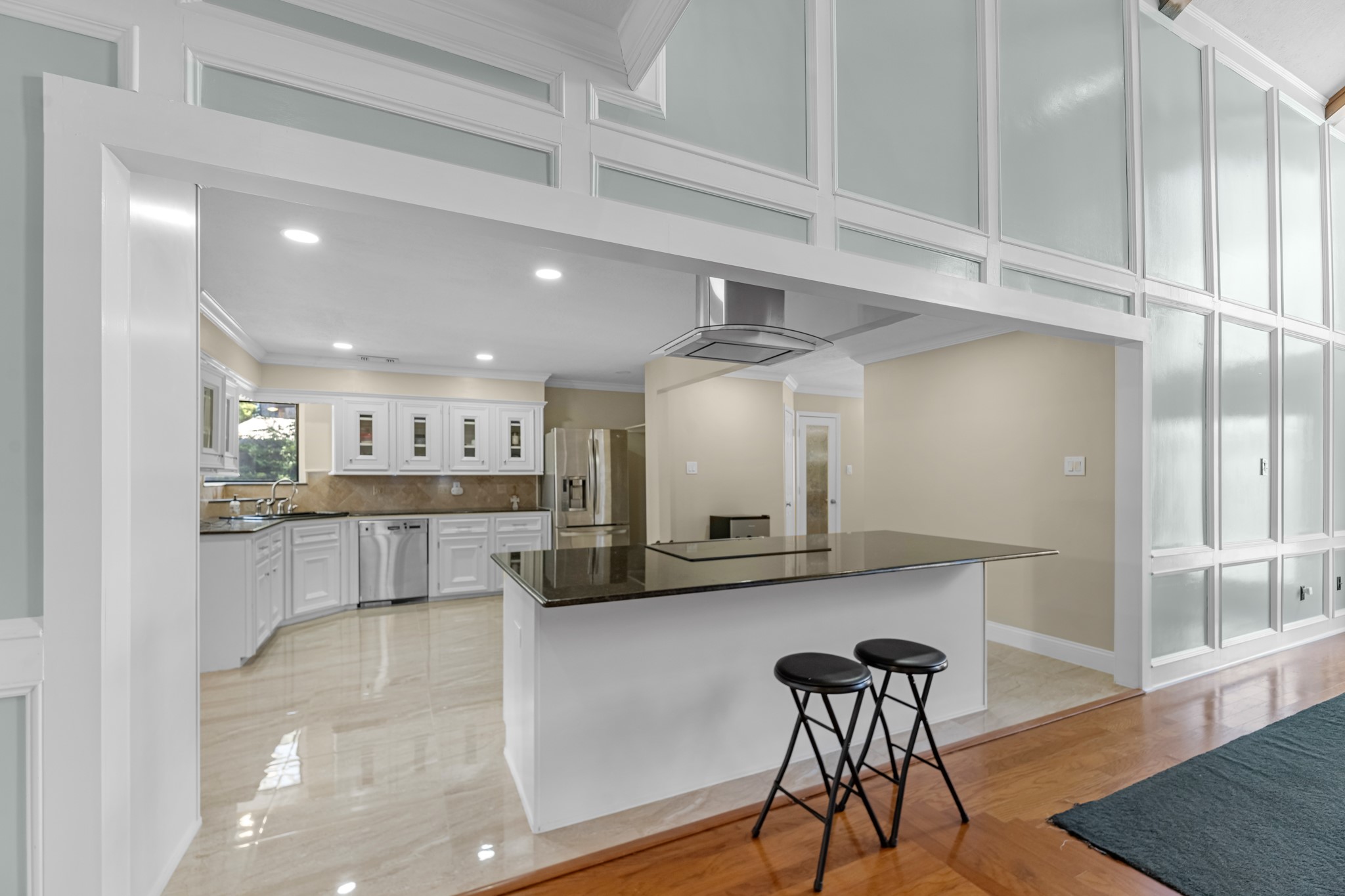 16114 Kempton Park Drive Spring, TX 77379 - Photo 7 of 22 a view of a kitchen and dining room