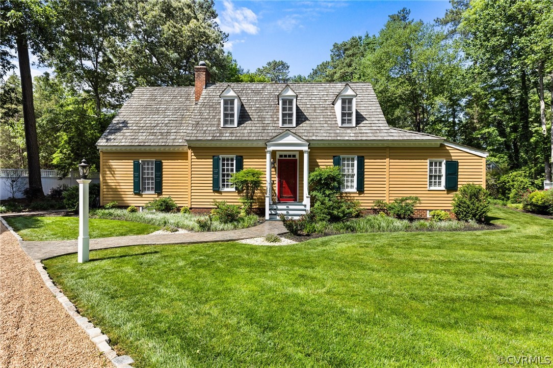 9822 Old Cannon Road Richmond, VA 23237 - Photo 2 of 6 a front view of a house with a yard