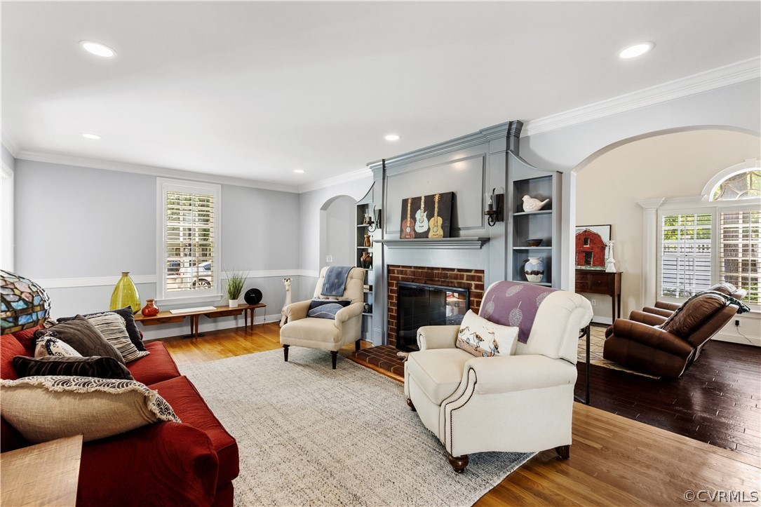 9822 Old Cannon Road Richmond, VA 23237 - Photo 6 of 6 a living room with furniture fireplace and a large window
