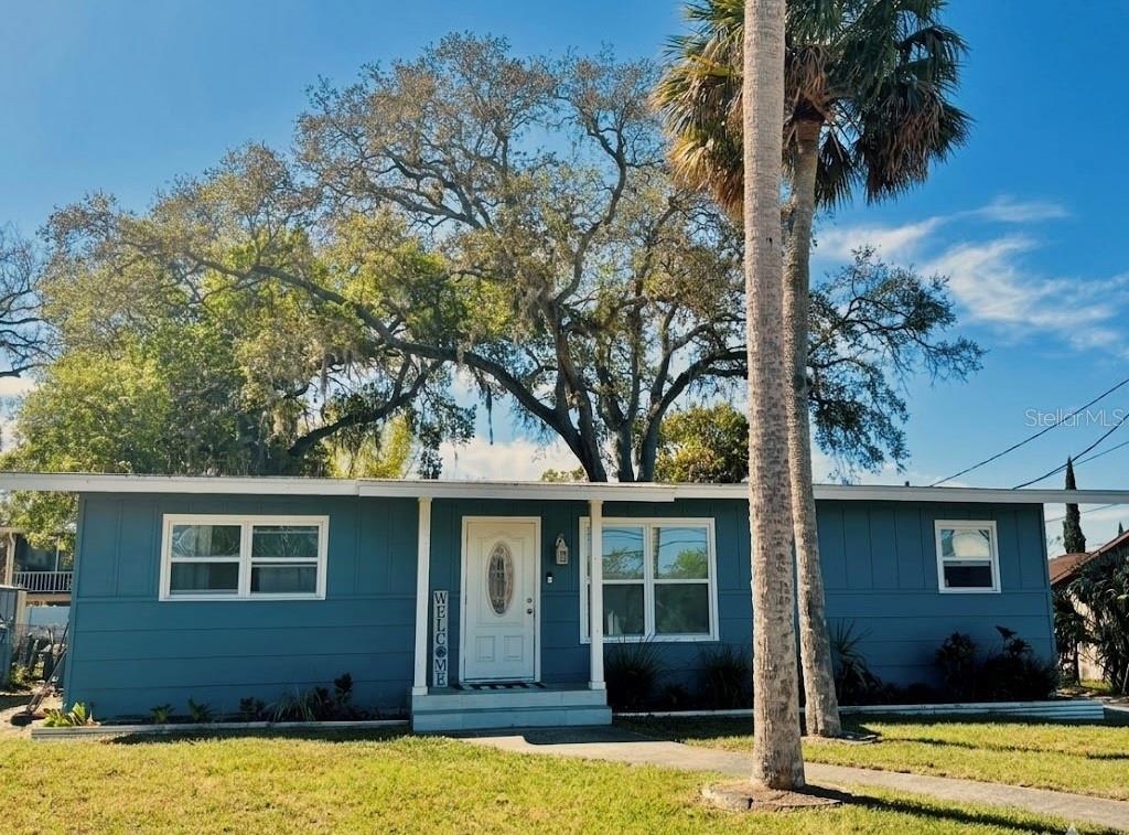 16 Jeff Road Largo, FL 33774 - Photo 1 of 14 a view of a house with a swimming pool