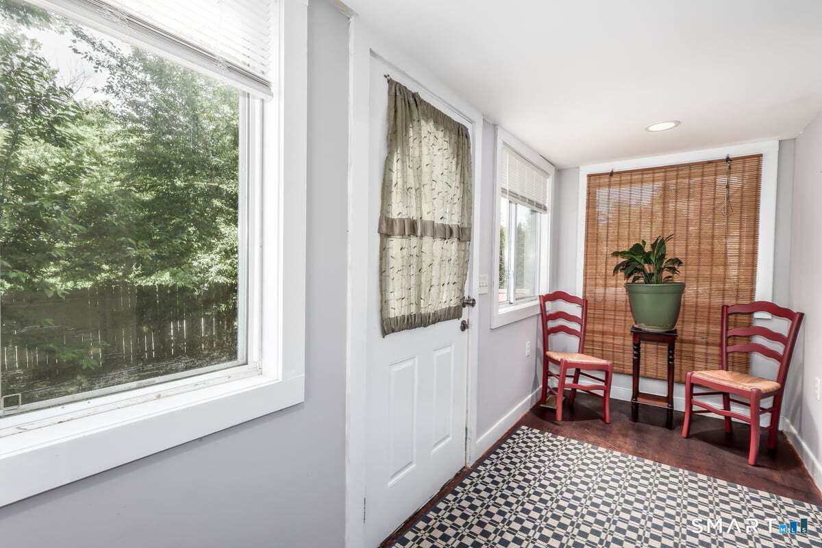 70 Dodgingtown Road Bethel, CT 06801 - Photo 3 of 27 a room with furniture and a window