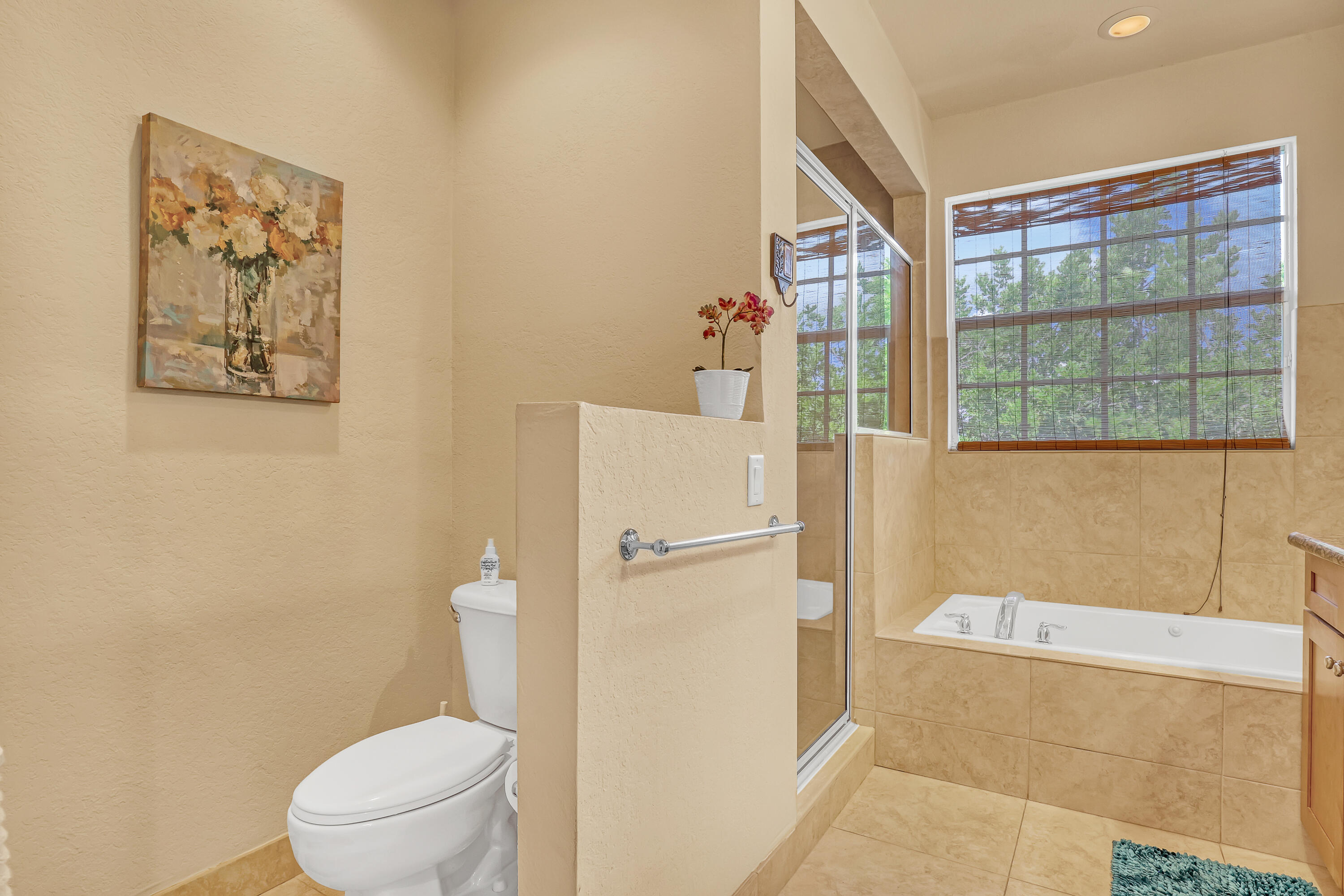 2560 Northeast 11th Street Pompano Beach, FL 33062 - Photo 8 of 18 a bathroom with a toilet and a shower