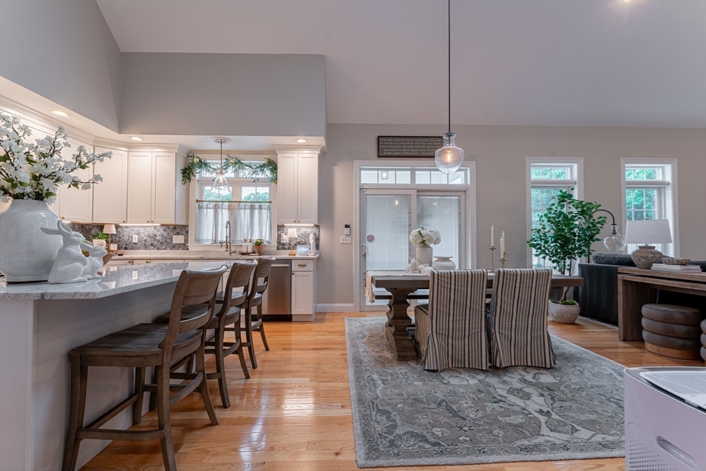 38 Cherry Street, Unit B Hudson, MA 01749 - Photo 4 of 33 a view of a dining room with furniture