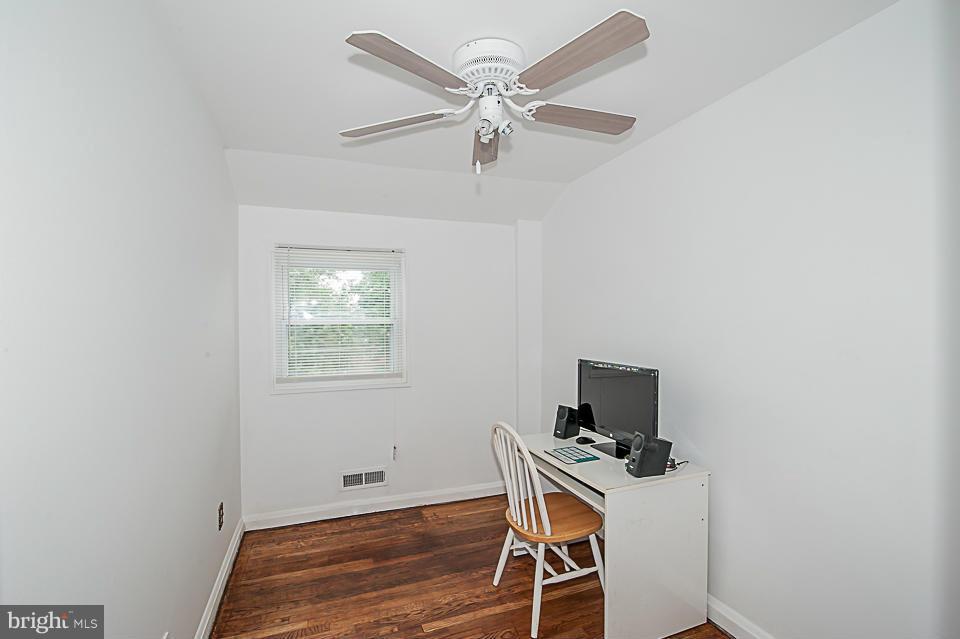 1072 Craftswood Road Baltimore, MD 21228 - Photo 11 of 18 a room with a window and a fan