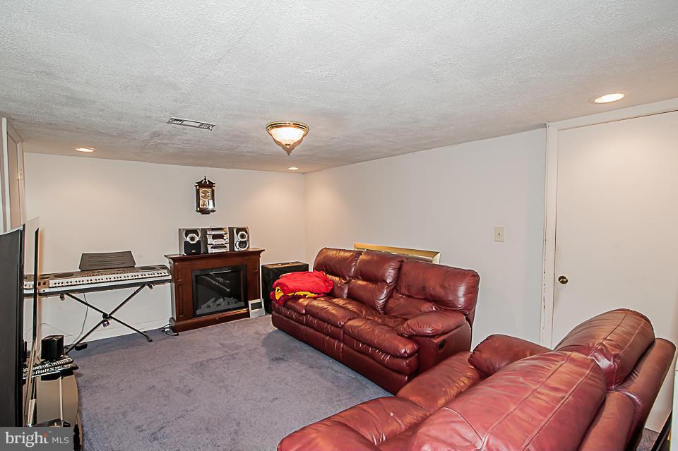 1072 Craftswood Road Baltimore, MD 21228 - Photo 13 of 18 a living room with furniture