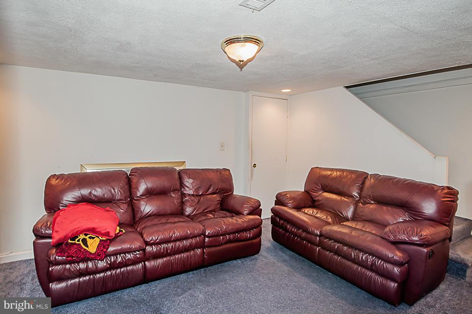 1072 Craftswood Road Baltimore, MD 21228 - Photo 15 of 18 a living room with furniture