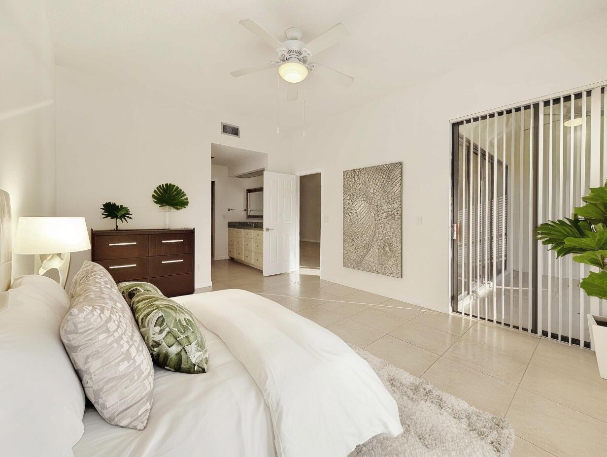 7535 La Paz Boulevard, Unit 107 Boca Raton, FL 33433 - Photo 20 of 28 tiffanyrachel_fiddle_fig_in_white_plante