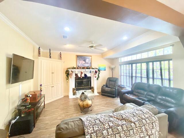 4401 Windrush Drive Niceville, FL 32578 - Photo 11 of 35 a bedroom with furniture and a flat screen tv