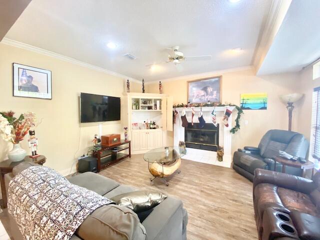 4401 Windrush Drive Niceville, FL 32578 - Photo 12 of 35 a living room with furniture and a flat screen tv