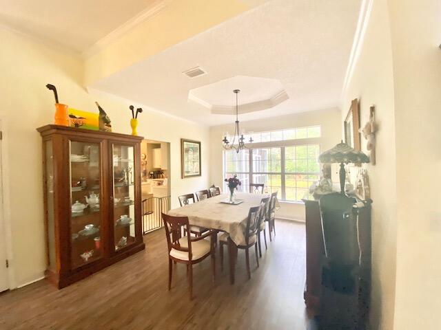 4401 Windrush Drive Niceville, FL 32578 - Photo 13 of 35 a view of a dining room with furniture window and outside view