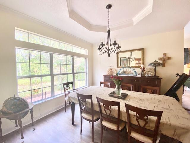 4401 Windrush Drive Niceville, FL 32578 - Photo 14 of 35 a view of a dining room with furniture window and outside view