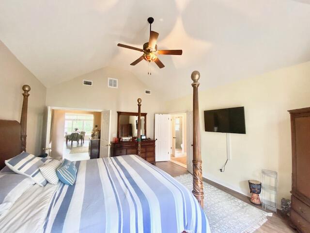 4401 Windrush Drive Niceville, FL 32578 - Photo 17 of 35 a bedroom with a bed and a flat screen tv