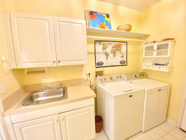 4401 Windrush Drive Niceville, FL 32578 - Photo 24 of 35 a utility room with a sink dryer and washer