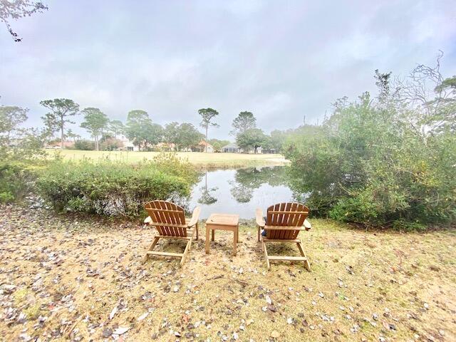 4401 Windrush Drive Niceville, FL 32578 - Photo 31 of 35 a view of a chair and table on the patio