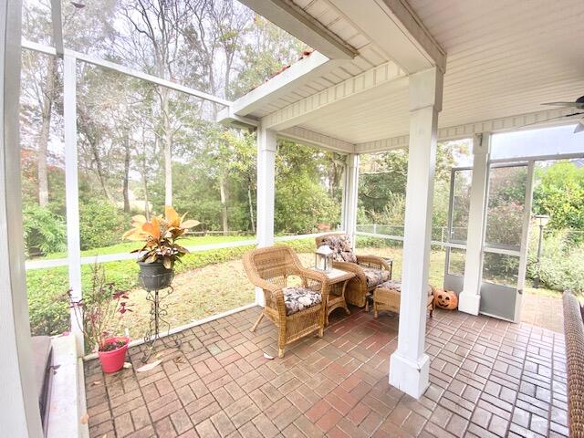 4401 Windrush Drive Niceville, FL 32578 - Photo 34 of 35 a living room filled with furniture and a large window