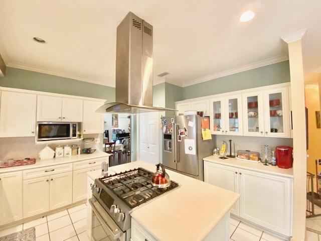 4401 Windrush Drive Niceville, FL 32578 - Photo 8 of 35 a kitchen with a stove a sink dishwasher and white refrigerator with cabinets