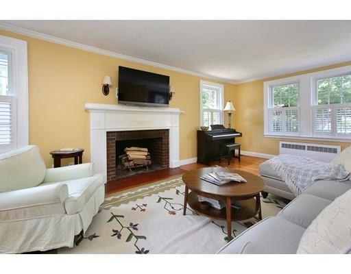 60 Arapahoe Road Newton, MA 02465 - Photo 4 of 13 a living room with furniture and a fireplace