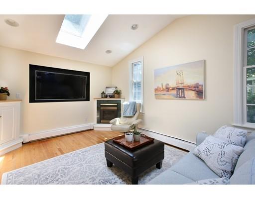 60 Arapahoe Road Newton, MA 02465 - Photo 7 of 13 a living room with furniture and a flat screen tv