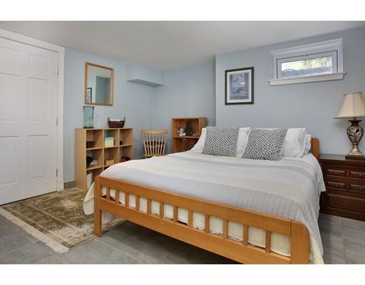 60 Arapahoe Road Newton, MA 02465 - Photo 8 of 13 a bedroom with a bed and a desk