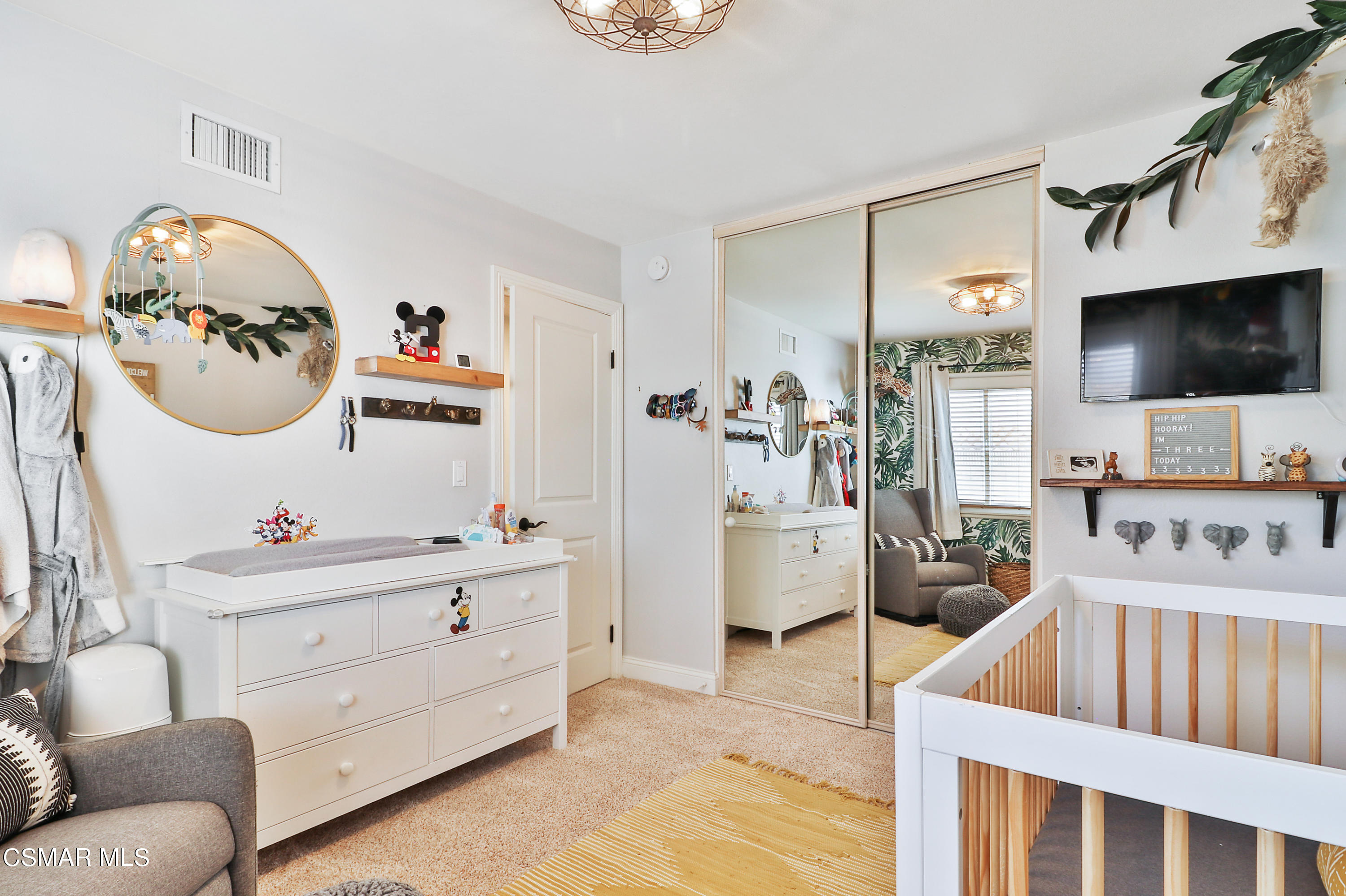 5938 Serena Street Simi Valley, CA 93063 - Photo 21 of 76 a living room with furniture and a flat screen tv