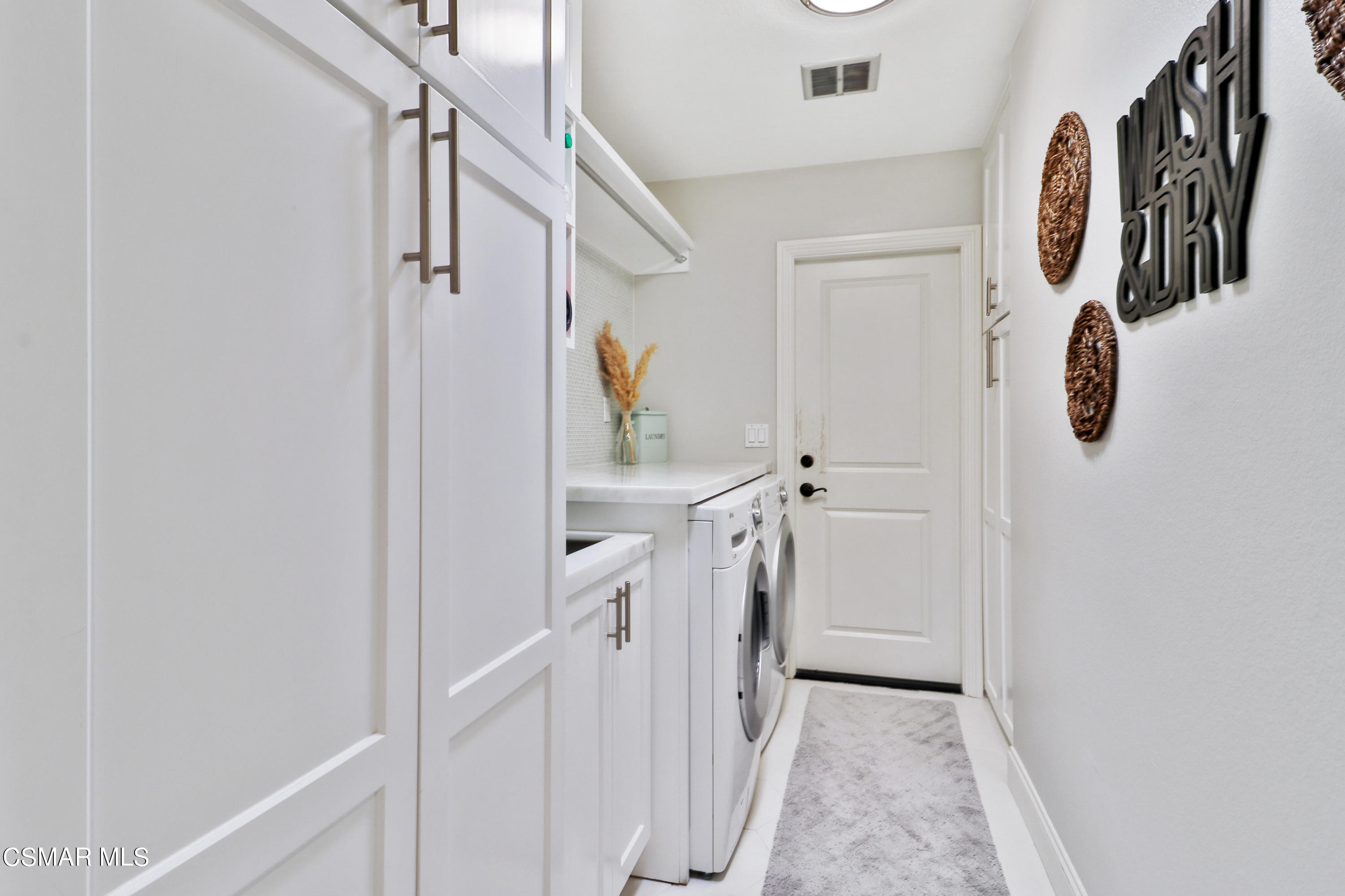 5938 Serena Street Simi Valley, CA 93063 - Photo 24 of 76 a bathroom with a sink and a mirror
