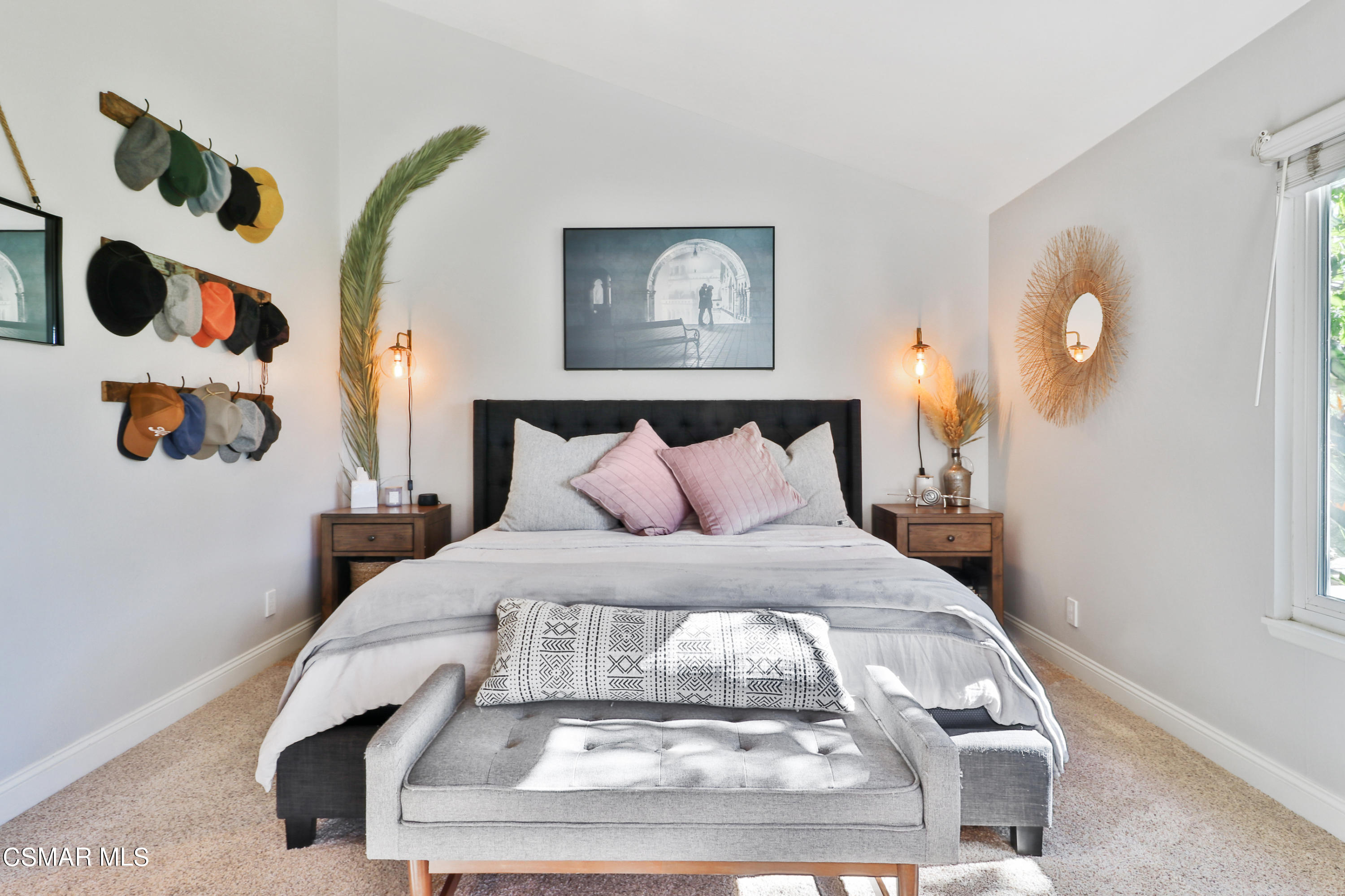 5938 Serena Street Simi Valley, CA 93063 - Photo 32 of 76 a bedroom with a bed and a painting on the wall