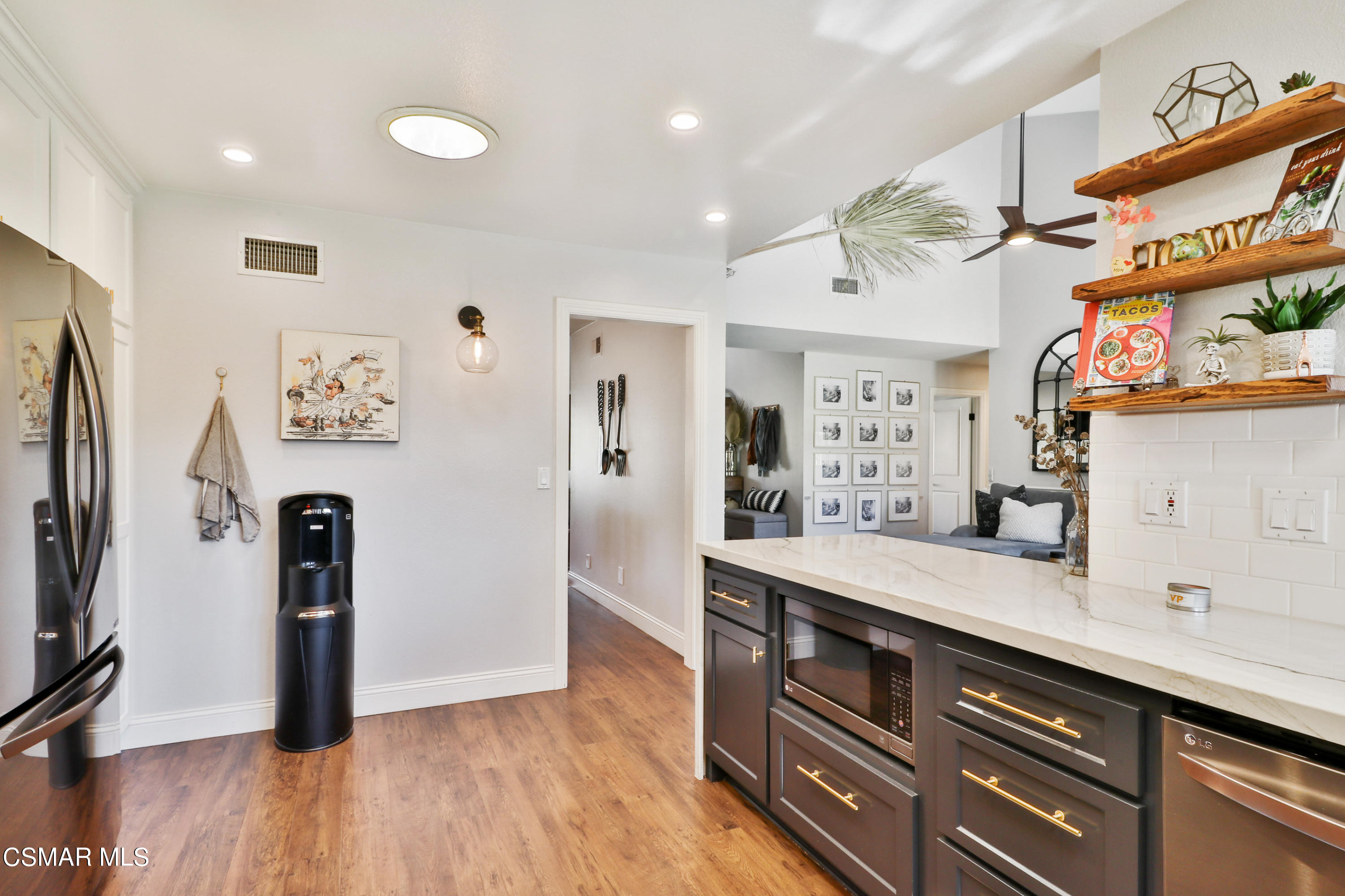5938 Serena Street Simi Valley, CA 93063 - Photo 46 of 76 a view of kitchen with stainless steel appliances cabinets and wooden floor