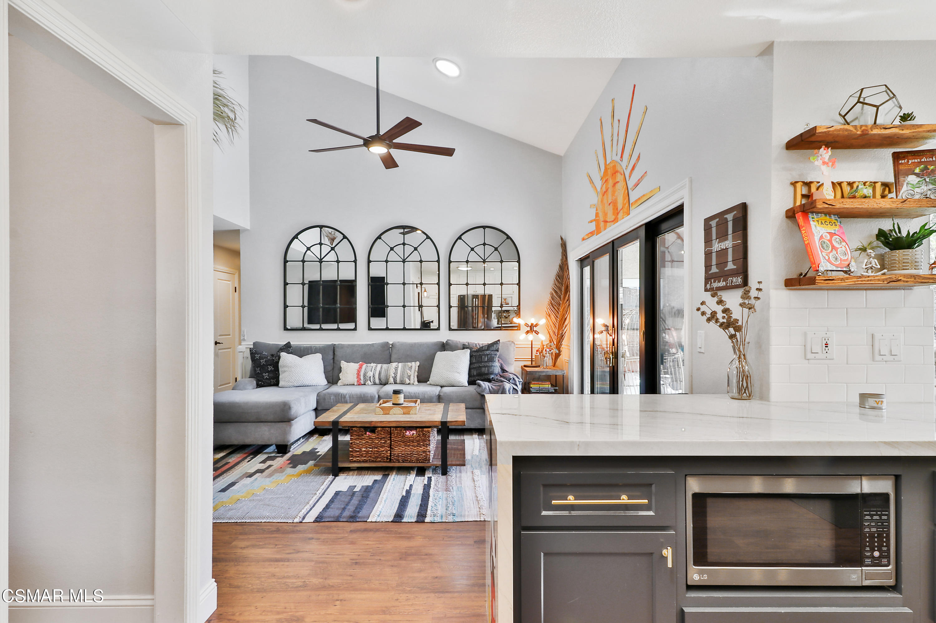 5938 Serena Street Simi Valley, CA 93063 - Photo 48 of 76 a living room with furniture and a fireplace