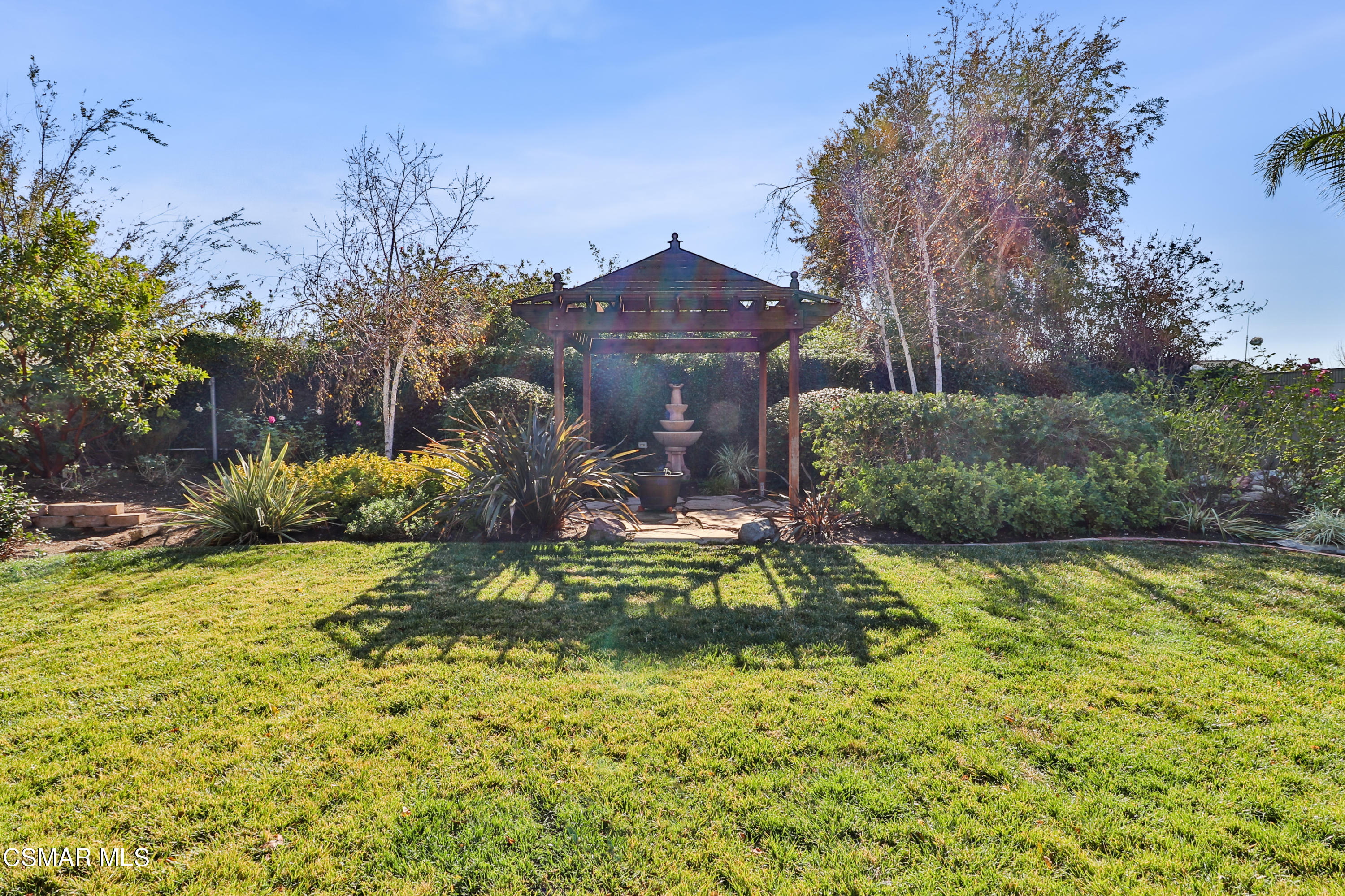 5938 Serena Street Simi Valley, CA 93063 - Photo 51 of 76 a view of a house with a yard