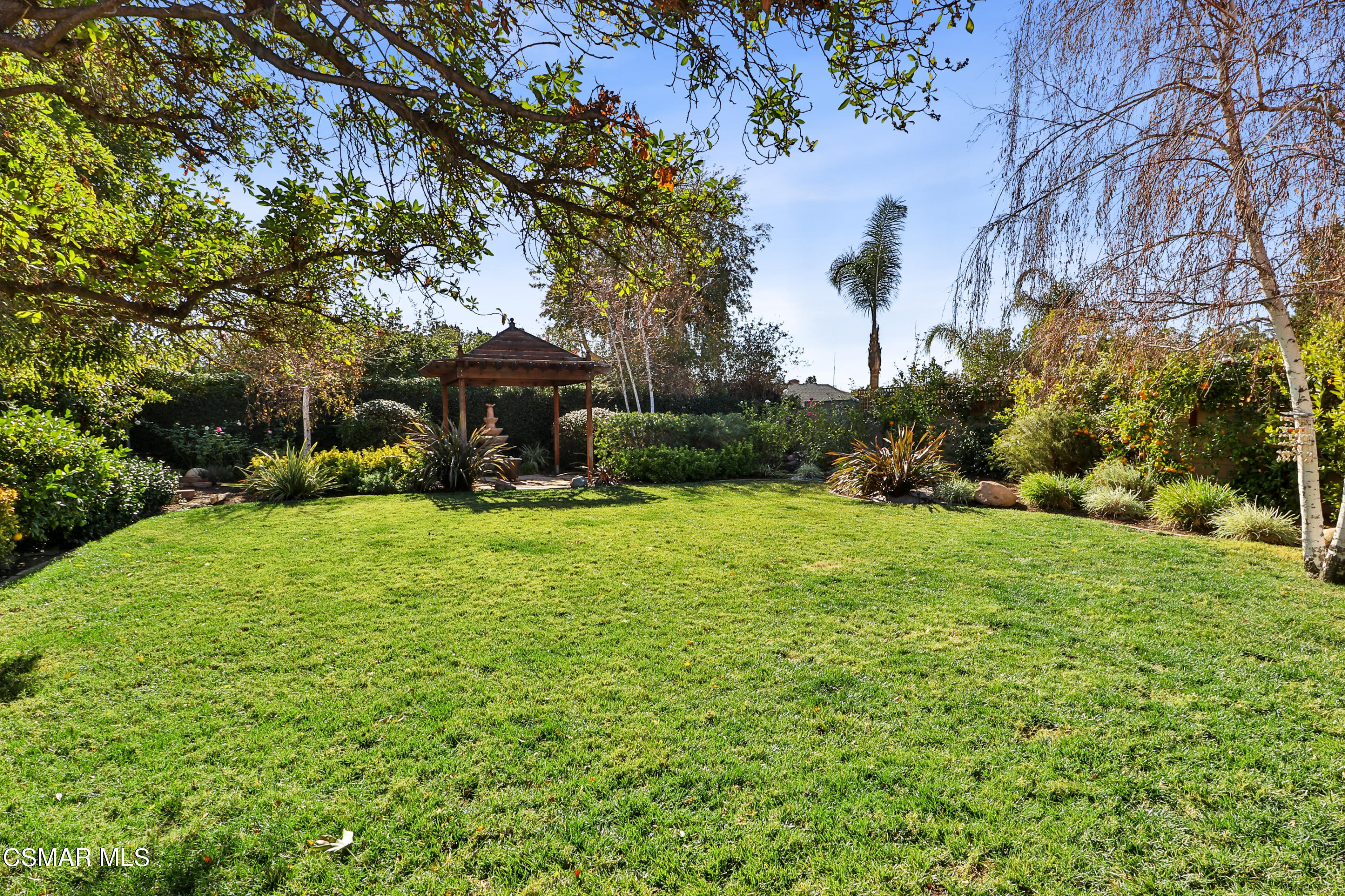 5938 Serena Street Simi Valley, CA 93063 - Photo 53 of 76 a view of a house with a yard