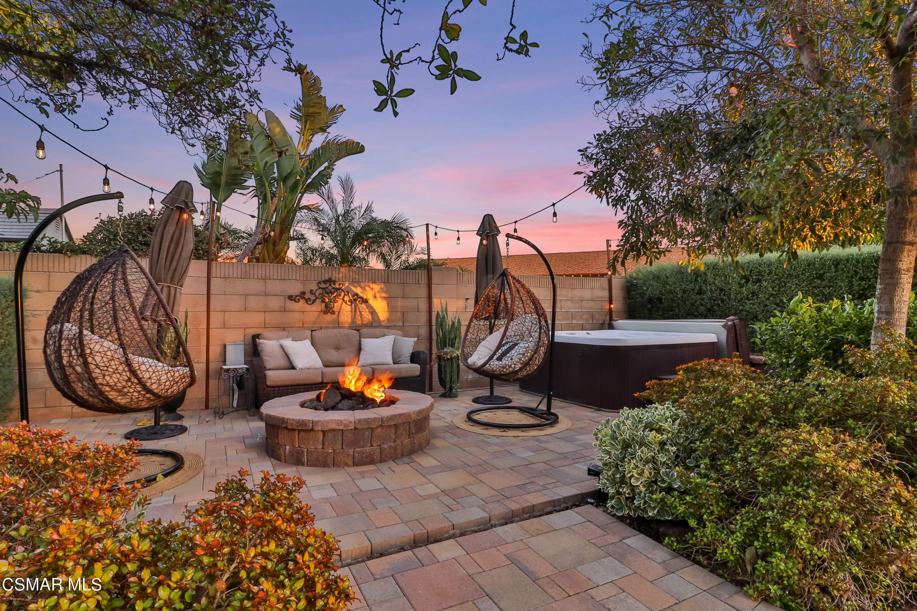 5938 Serena Street Simi Valley, CA 93063 - Photo 63 of 76 a view of a backyard with plants and a patio