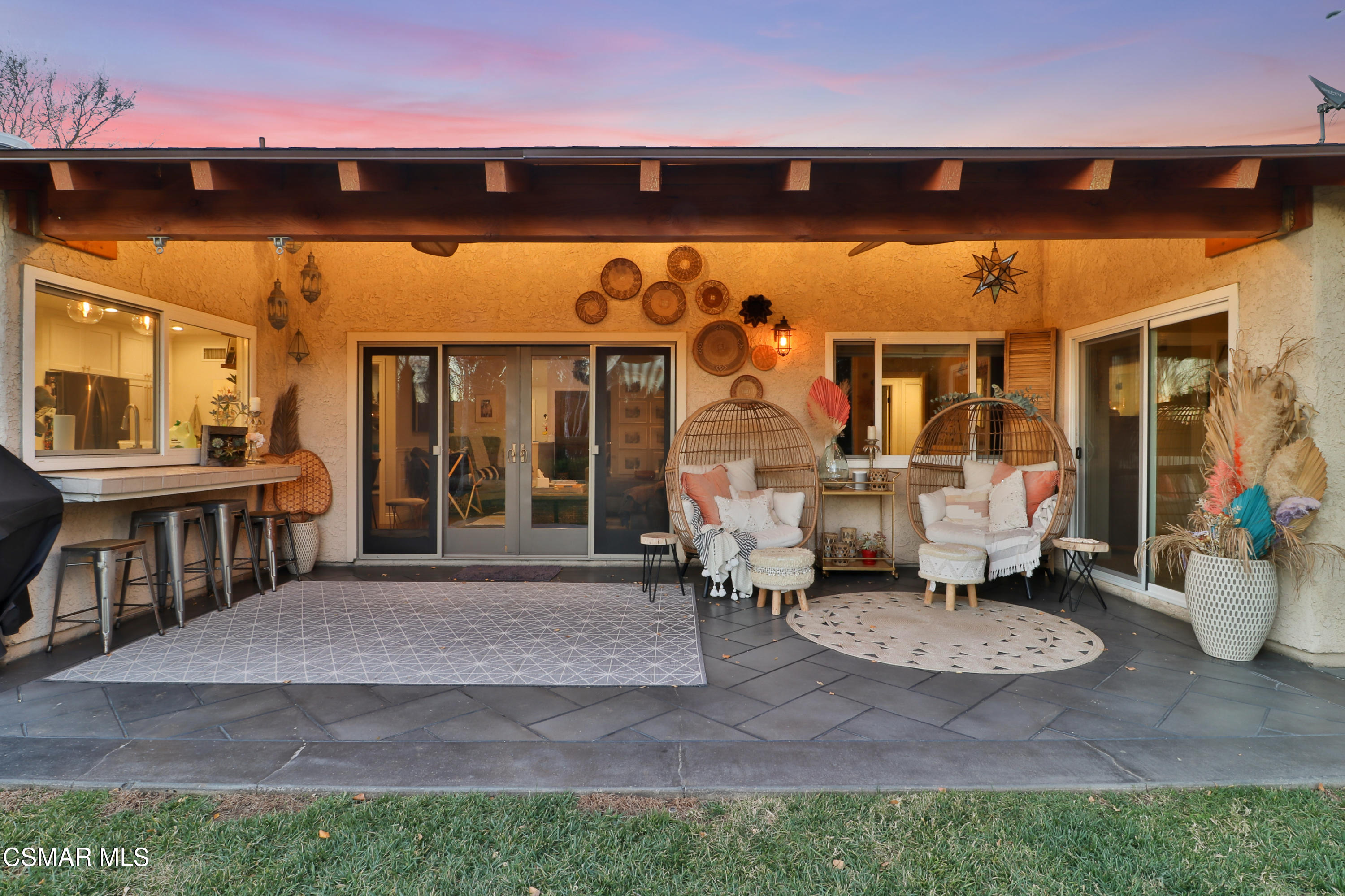 5938 Serena Street Simi Valley, CA 93063 - Photo 76 of 76 a view of a patio with a table and chairs