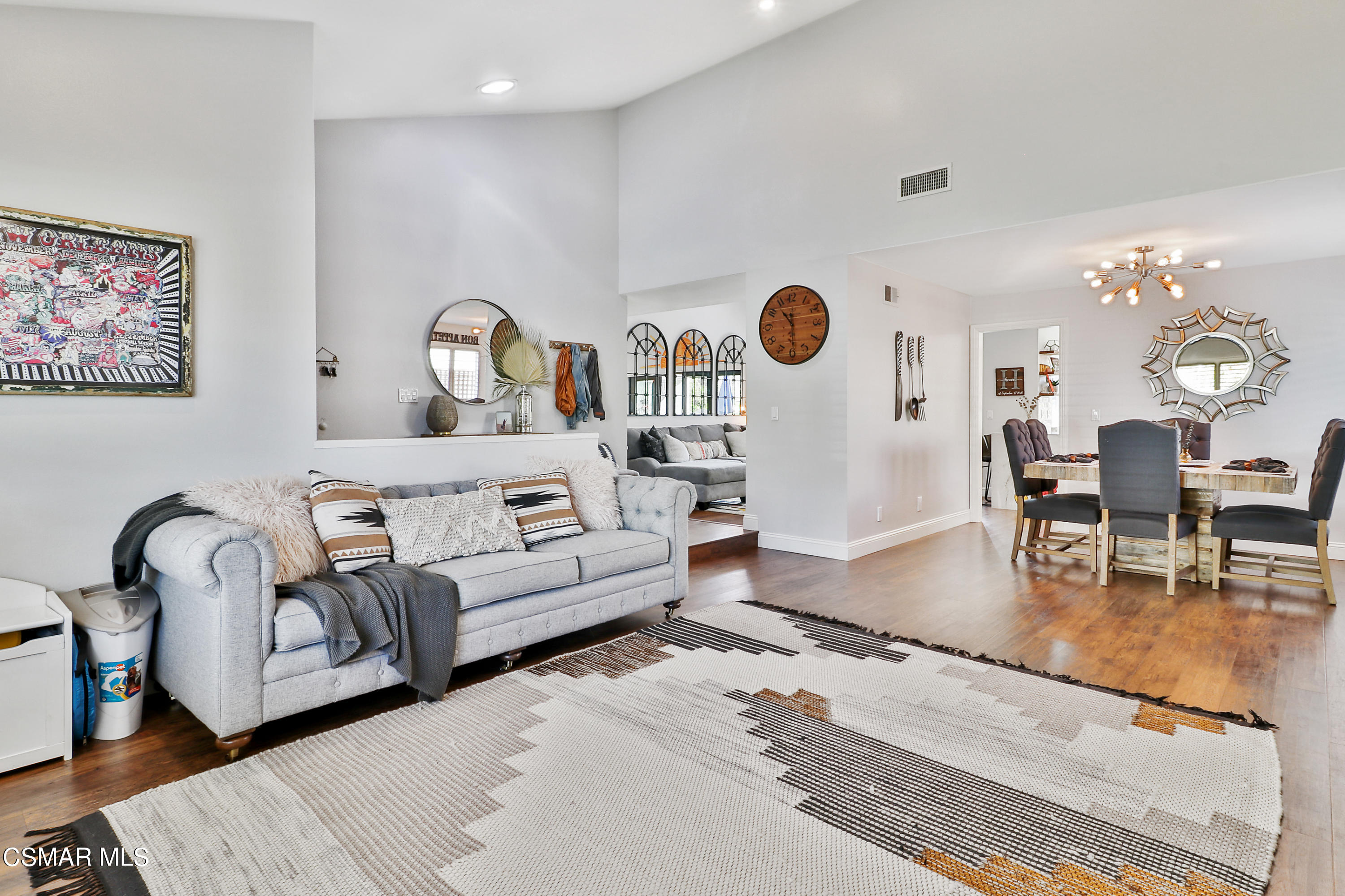 5938 Serena Street Simi Valley, CA 93063 - Photo 9 of 76 a living room with furniture and a clock