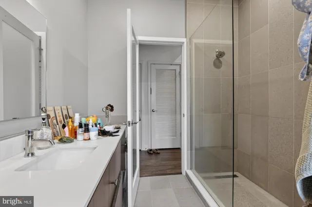 a picture of a bench in front of a door