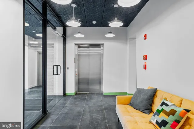 a bathroom with a sink and a shower