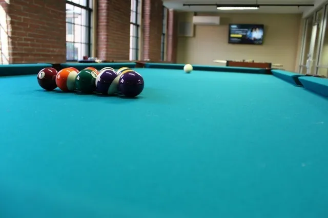 a media room with lots of chairs and a projector