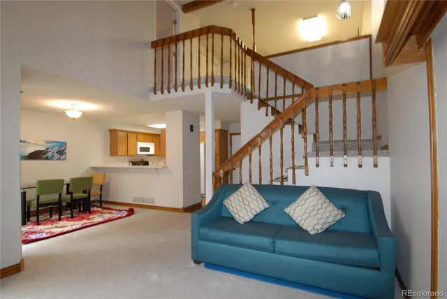 a view of staircase with furniture