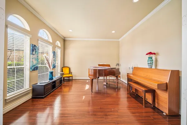 a kitchen with stainless steel appliances granite countertop a stove a washer and dryer