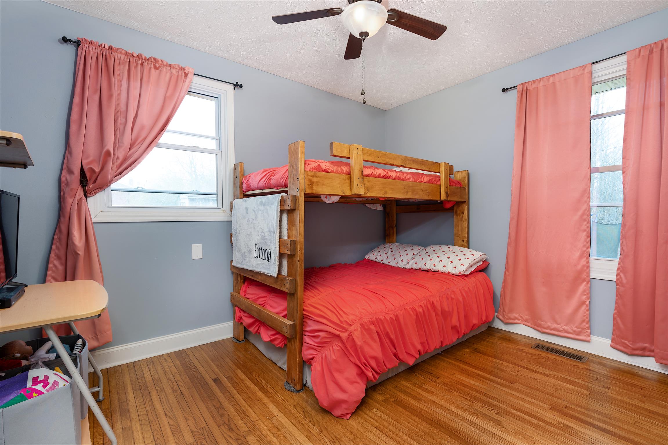 1578 Hickory Point Road Clarksville, TN 37043 - Photo 13 of 17 a bedroom with a bed and a chandelier