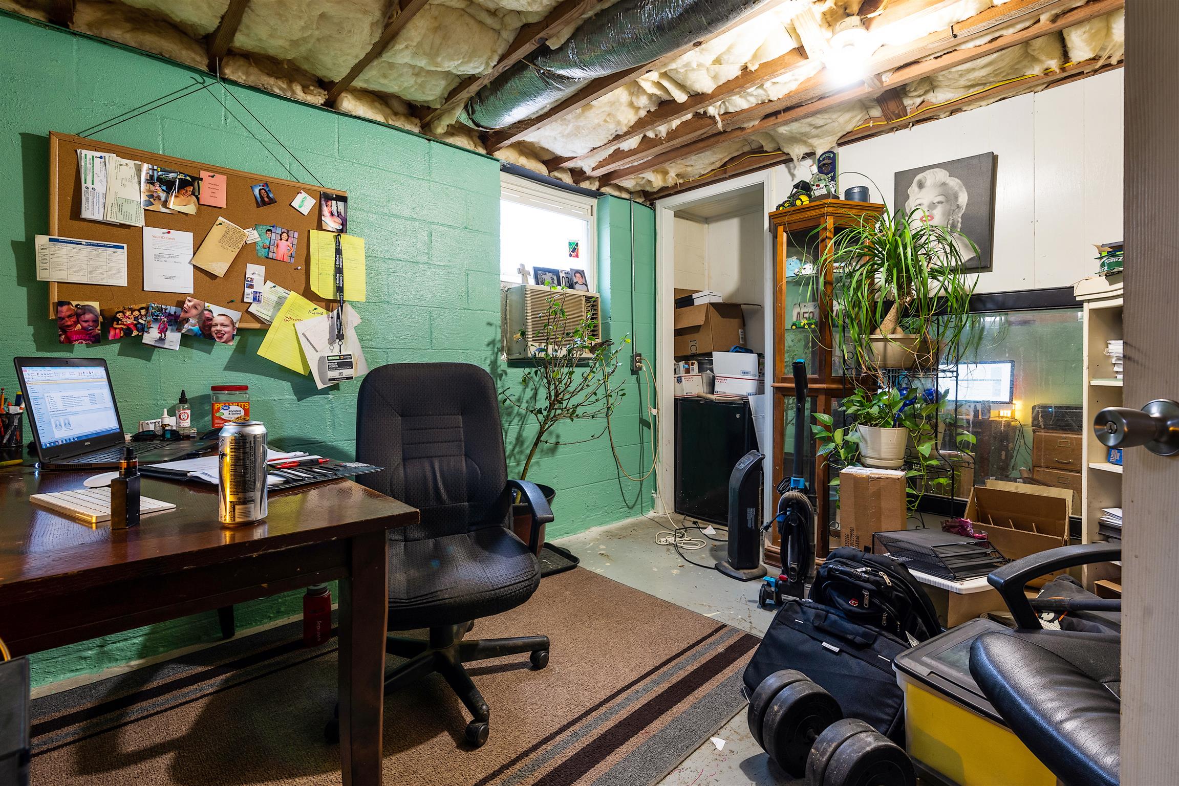 1578 Hickory Point Road Clarksville, TN 37043 - Photo 14 of 17 a view of a workspace with furniture and a potted plant