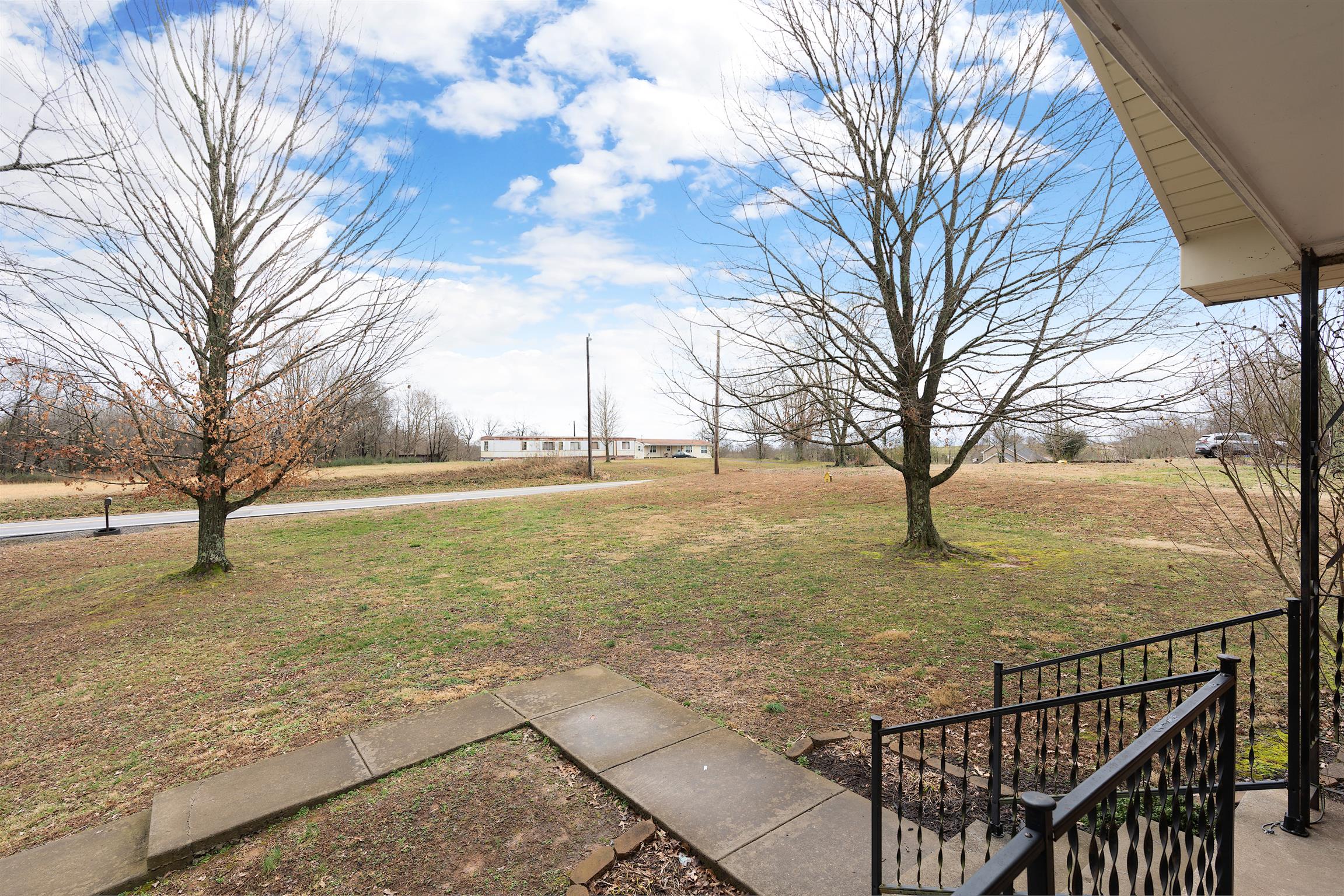 1578 Hickory Point Road Clarksville, TN 37043 - Photo 15 of 17 a view of a yard with an ocean view
