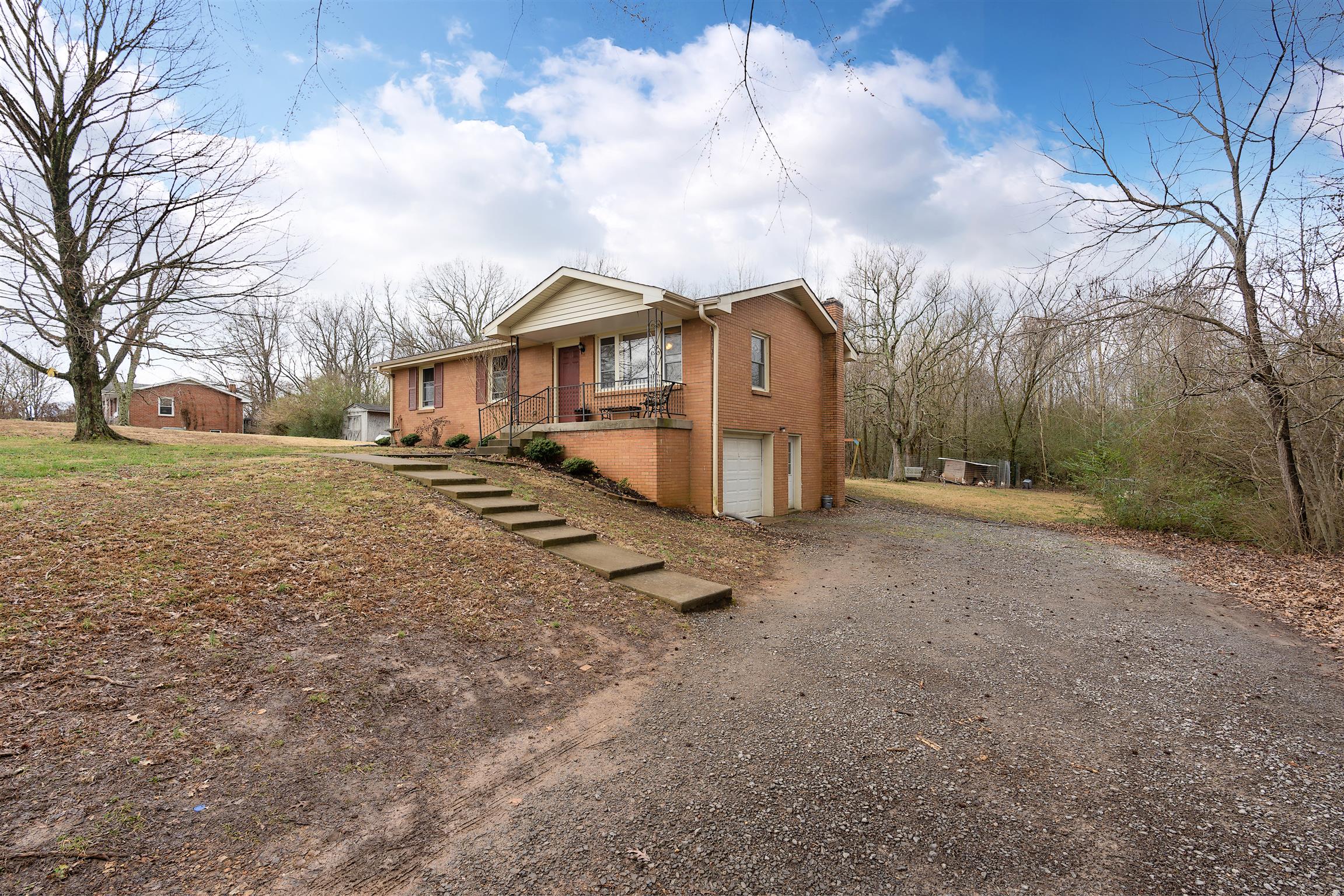 1578 Hickory Point Road Clarksville, TN 37043 - Photo 17 of 17 a view of a house with a yard