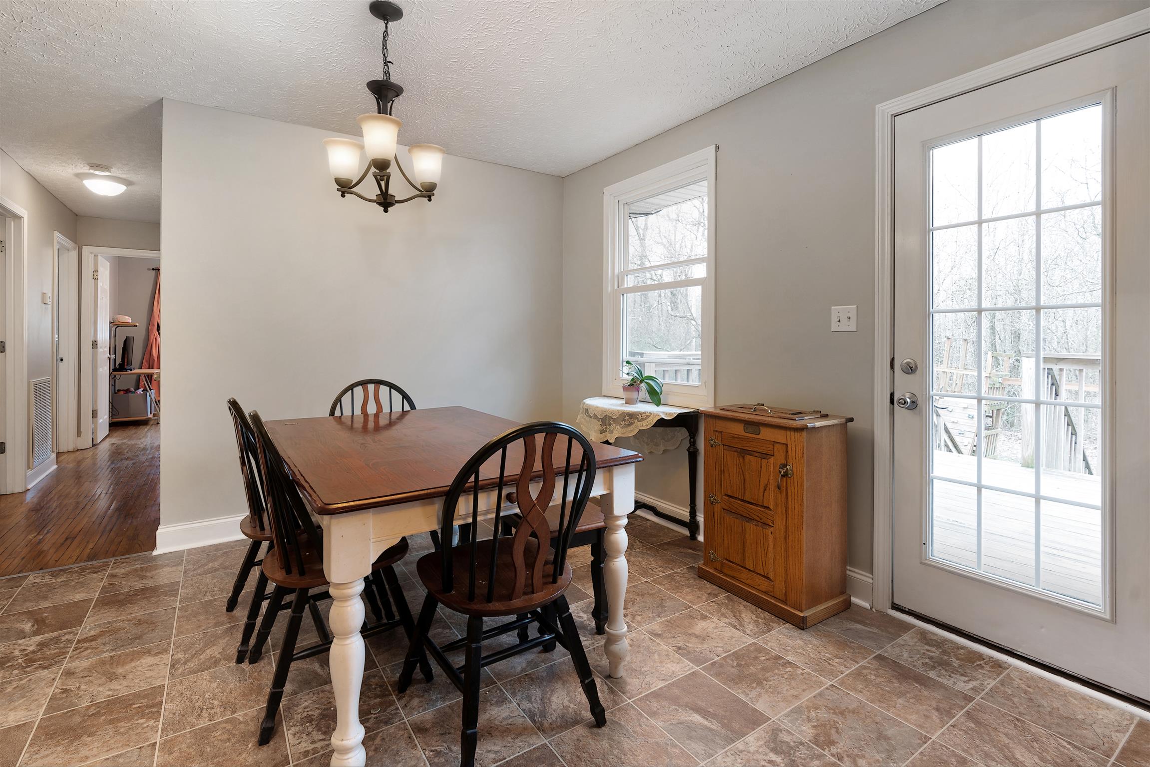 1578 Hickory Point Road Clarksville, TN 37043 - Photo 5 of 17 a view of a dining room with furniture and chandelier