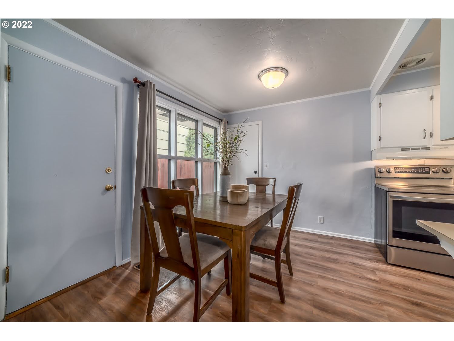 1453 Olympic Street Springfield, OR 97477 - Photo 11 of 31 a view of a dining room with furniture and window