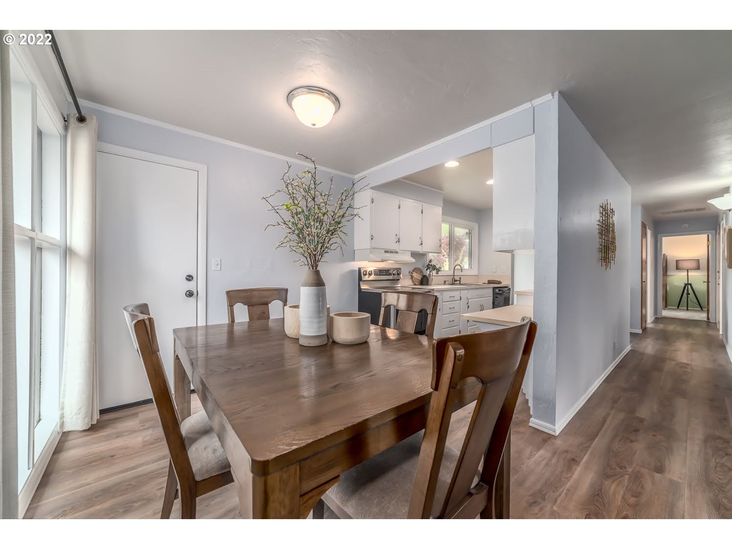 1453 Olympic Street Springfield, OR 97477 - Photo 12 of 31 a dining room with furniture and wooden floor
